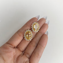 Load image into Gallery viewer, 10 x 14 mm. Oval Cut Yellow Brazilian Citrine with Topaz Accents Earrings