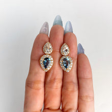 Load image into Gallery viewer, 6 x 9 mm. Pear Cut London Blue and White Brazilian Topaz with Cz Halo Drop Earrings