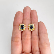 Load image into Gallery viewer, 5 x 7 mm. Oval Cut London Blue Brazilian Topaz with Cz Accents Earrings
