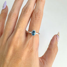 Load image into Gallery viewer, 4 x 6 mm. Oval Cut London Blue Brazilian Topaz with Cz Halo Ring