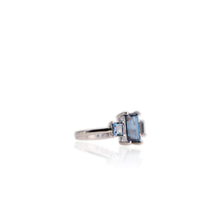 Load image into Gallery viewer, 5 x 8 mm. Octagon Cut London Blue Brazilian Topaz Trilogy Ring
