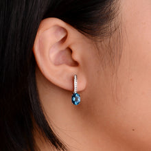 Load image into Gallery viewer, 6 x 8 mm. Oval Cut London Blue Brazilian Topaz with Cz Accents Earrings
