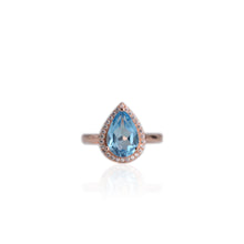 Load image into Gallery viewer, 8 x 12 mm. Pear Cut Sky Blue Brazilian Topaz with Cz Halo Ring
