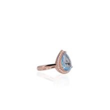 Load image into Gallery viewer, 8 x 12 mm. Pear Cut Sky Blue Brazilian Topaz with Cz Halo Ring
