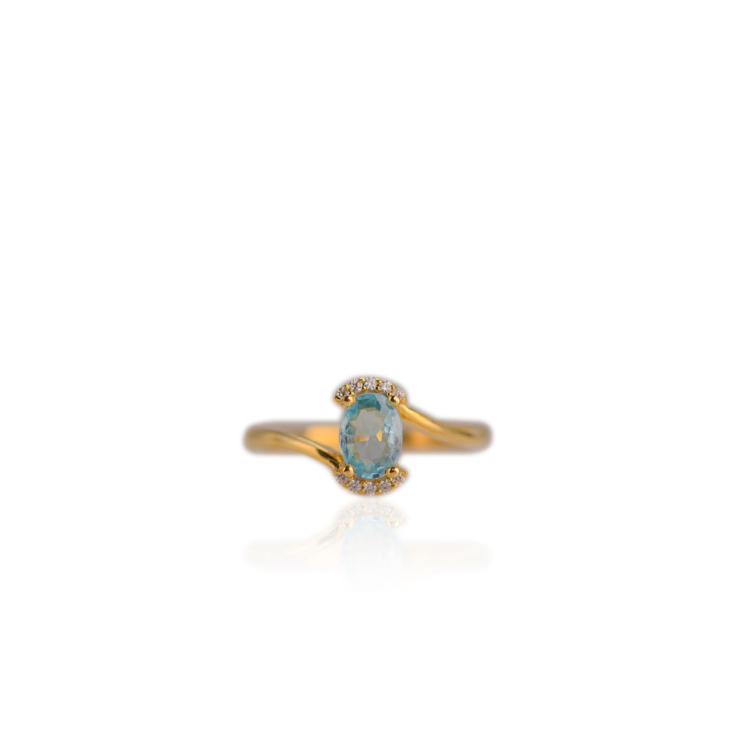 5 x 7 mm. Oval Cut Blue Cambodian Zircon with Cz Accents Ring