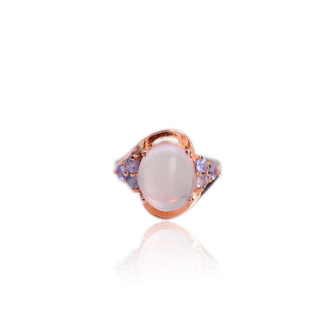 10 x 12 mm. Oval Cabochon Pink African Rose Quartz with Tanzanite Accents Ring
