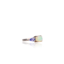 Load image into Gallery viewer, 7 x 9 mm. Oval Cabochon Multi-coloured Ethiopian Opal and Tanzanite Trilogy Ring (Blemished)
