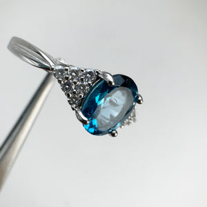 6 x 8 mm. Oval Cut London Blue Brazilian Topaz with Cz Accents Ring (Blemished)
