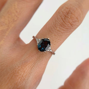 6 x 8 mm. Oval Cut London Blue Brazilian Topaz with Cz Accents Ring
