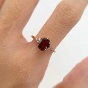 6 x 8 mm. Oval Cut Red African Garnet with Cz Accents Ring