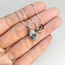 Load image into Gallery viewer, 6 x 8 mm. Pear Cut Light Blue Brazilian Aquamarine with Cz Halo Pendant and Necklace

