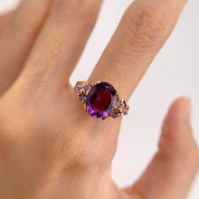 Load image into Gallery viewer, 9 x 11 mm. Oval Cut Purple Brazilian Amethyst with Tanzanite Accents Ring
