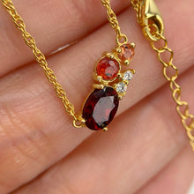 Load image into Gallery viewer, 5 x 7 mm. Oval Cut Red African Garnet and Sapphire with Cz Accents Cluster Necklace
