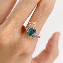 Load image into Gallery viewer, 6 x 8 mm. Oval Cut Green Zambian Emerald with Cz Accents Ring
