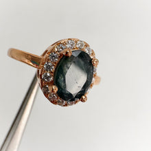 Load image into Gallery viewer, 6 x 8 mm. Oval Cut Blue Green Thai Sapphire with Cz Halo Ring
