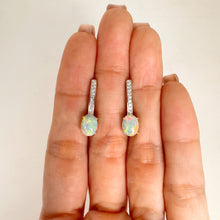 Load image into Gallery viewer, 6 x 8 mm. Oval Cabochon Multi-coloured Ethiopian Opal with Cz Accents Earrings
