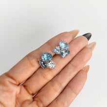 Load image into Gallery viewer, 7 x 9 mm. Oval Cut Swiss Blue Brazilian Topaz Cluster Earrings

