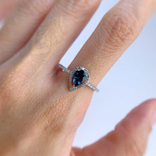 Load image into Gallery viewer, 5 x 8 mm. Pear Cut London Blue Brazilian Topaz with Cz Halo Ring
