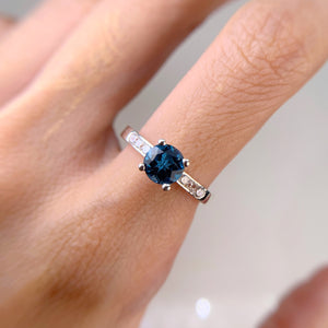 6 mm. Round Cut London Blue Brazilian Topaz with Cz Accents Ring