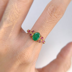 5 x 7 mm. Oval Cut Green Brazilian Emerald with Ruby Accents Ring (Blemished)