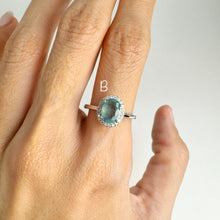 Load image into Gallery viewer, 6 x 8 mm. Oval Cut Green Zambian Emerald with Cz Halo Ring
