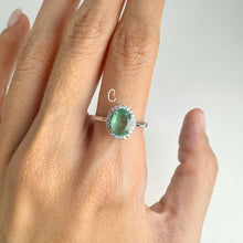 Load image into Gallery viewer, 6 x 8 mm. Oval Cut Green Zambian Emerald with Cz Halo Ring
