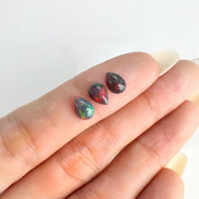 Load image into Gallery viewer, Lot of 3 5 x 7 mm. Pear Cabochon Black Ethiopian Opal
