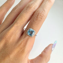 Load image into Gallery viewer, 7 mm. Cushion Cut Swiss Blue Brazilian Topaz with Cz Halo Ring
