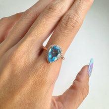 Load image into Gallery viewer, 8 x 12 mm. Pear Cut Sky Blue Brazilian Topaz with Cz Halo Ring
