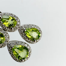 Load image into Gallery viewer, 5 x 7 mm. Pear Cut Green Pakistani Peridot with Cz Halo Earrings
