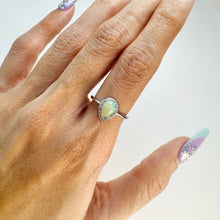 Load image into Gallery viewer, 5 x 7 mm. Pear Cabochon Multi-coloured Ethiopian Opal with Cz Halo Ring

