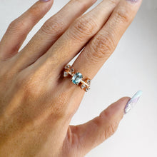 Load image into Gallery viewer, 5 x 7 mm. Oval Cut Blue Cambodian Zircon with Topaz Accents Ring

