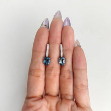 Load image into Gallery viewer, 6 x 8 mm. Oval Cut London Blue Brazilian Topaz with Cz Accents Earrings
