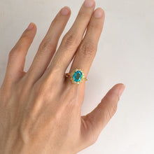 Load image into Gallery viewer, 7 x 9 mm. Oval Cut Blue Brazilian Mystic Topaz with Cz Accents Ring
