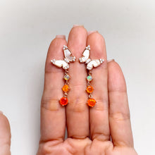 Load image into Gallery viewer, 4 mm. Round Cut Orange Ethiopian Opal, Mother of Pearl with Cz Accents Butterfly Drop Earrings
