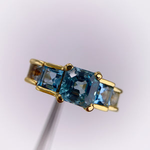 Handmade 6 mm. Asscher Cut Blue Cambodian Zircon and Topaz Cluster Ring (Blemished)