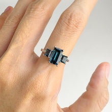 Load image into Gallery viewer, 5 x 8 mm. Octagon Cut London Blue Brazilian Topaz Trilogy Ring
