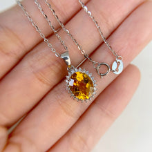 Load image into Gallery viewer, 8 x 10 mm. Oval with Checkerboard Cut Yellow Brazilian Citrine with Topaz Accents Pendant and Necklace
