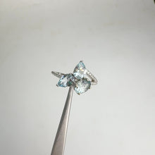 Load and play video in Gallery viewer, 5 x 7 mm. Oval Cut Light Blue Brazilian Aquamarine with Cz Accents Cluster Ring

