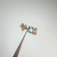 Load and play video in Gallery viewer, 5 x 7 mm. Oval Cut Blue Cambodian Zircon with Topaz Accents Ring

