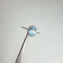 Load and play video in Gallery viewer, 6 x 8 mm. Oval Cut Sky Blue Brazilian Topaz with Cz Accents Ring
