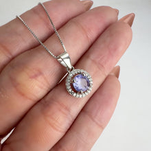 Load and play video in Gallery viewer, 6 mm. Round Cut Blue Violet Tanzanite with Cz Halo Pendant and Necklace (Blemished)
