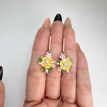Load and play video in Gallery viewer, 10 mm. Carved Flower Yellow Mother of Pearl with Cz Accents Drop Earrings
