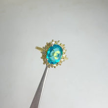 Load and play video in Gallery viewer, 7 x 9 mm. Oval Cut Blue Brazilian Mystic Topaz with Cz Accents Ring
