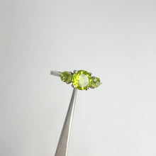 Load and play video in Gallery viewer, 6 mm. Round Cut Green Pakistani Peridot Trilogy Ring
