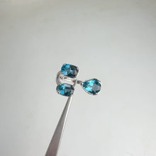 Load and play video in Gallery viewer, 6 x 9 mm. Pear Cut London Blue Brazilian Topaz Open Ring
