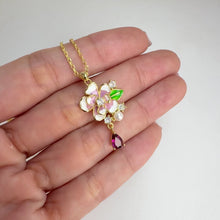 Load and play video in Gallery viewer, 4 x 6 mm. Pear Cut Purple African Rhodolite Garnet with Cz and Faux Pearl Accents Flower Drop Pendant and Necklace
