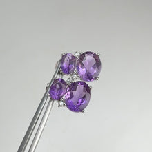 Load and play video in Gallery viewer, 8 x 10 mm. Oval Cut Purple Brazilian Amethyst with Cz Accents Earrings
