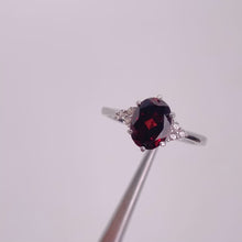 Load and play video in Gallery viewer, 6 x 8 mm. Oval Cut Red African Garnet with Cz Accents Ring

