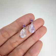 Load and play video in Gallery viewer, 8 x 12 mm. Pear Cabochon White Indian Moonstone with Amethyst Accents Earrings
